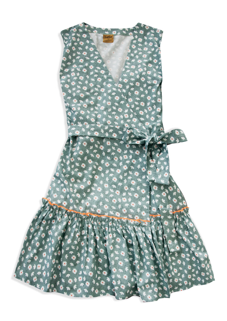 Upgrade Your Summer Look with Our Green Floral Wrap Dress! Embrace the summer vibes with our stunning women's wrap dress adorned with green flowers. Mini Me fashion options available, allowing you to twin with your tween, girl, or baby girl to elevated your summer fashion style. Check out our women dress collection.