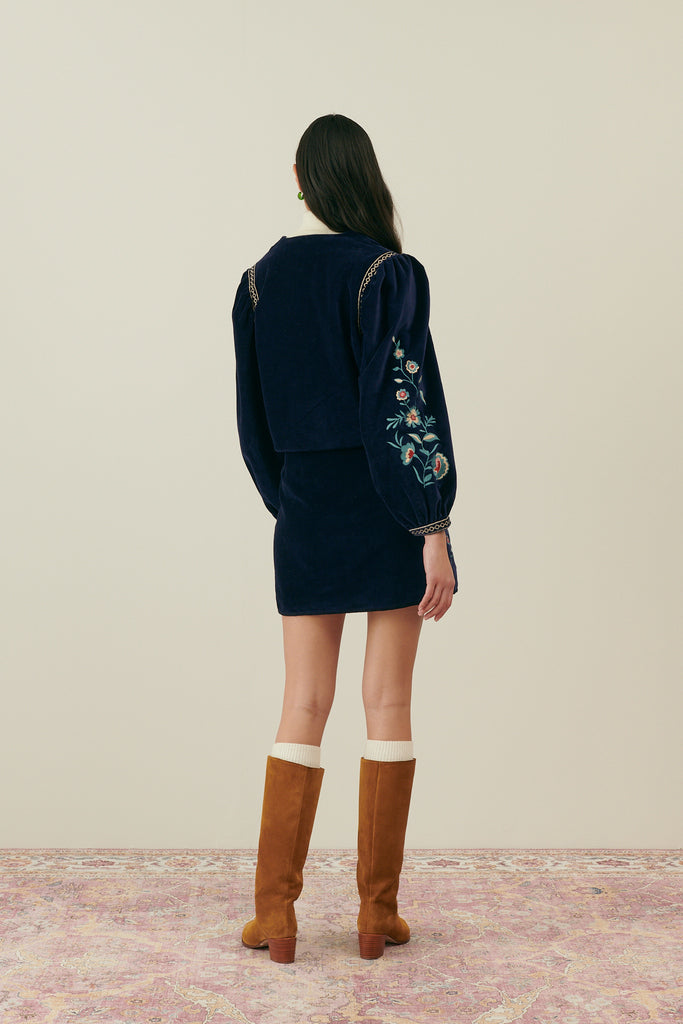 The high waisted skirt is must have womans sustainable wardrobe, made with organic cotton in a midnight color, this skirt features velvet texture with embrodery