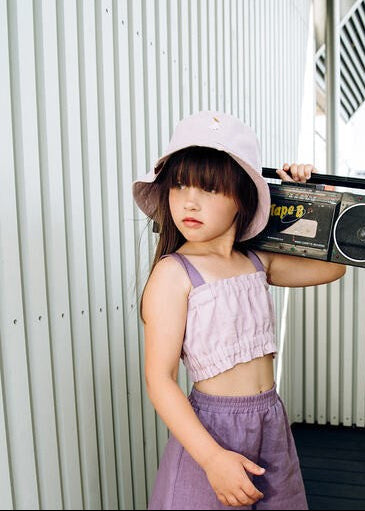 Close-up of lilac linen bucket hat showing pear embroidery detail - chemical-free kids hat