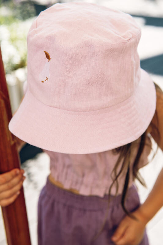 This kids bucket hat is the perfect choice for summer days, this lilacl linen bucket hat for kids is breathable and easy to wear hat that kids keep on.