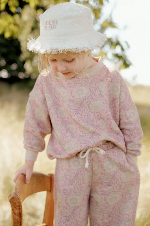 Kids and baby bucket sun hat, which is not only lightweight and stylish also comes in flower print. Designed by Louise Misha. Mini Me matching is available