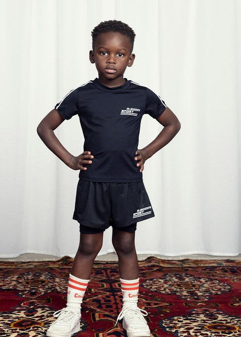 M.Rodini Sports black quickdry T-shirt in action — sustainable kids activewear HK, AU, JP & SG