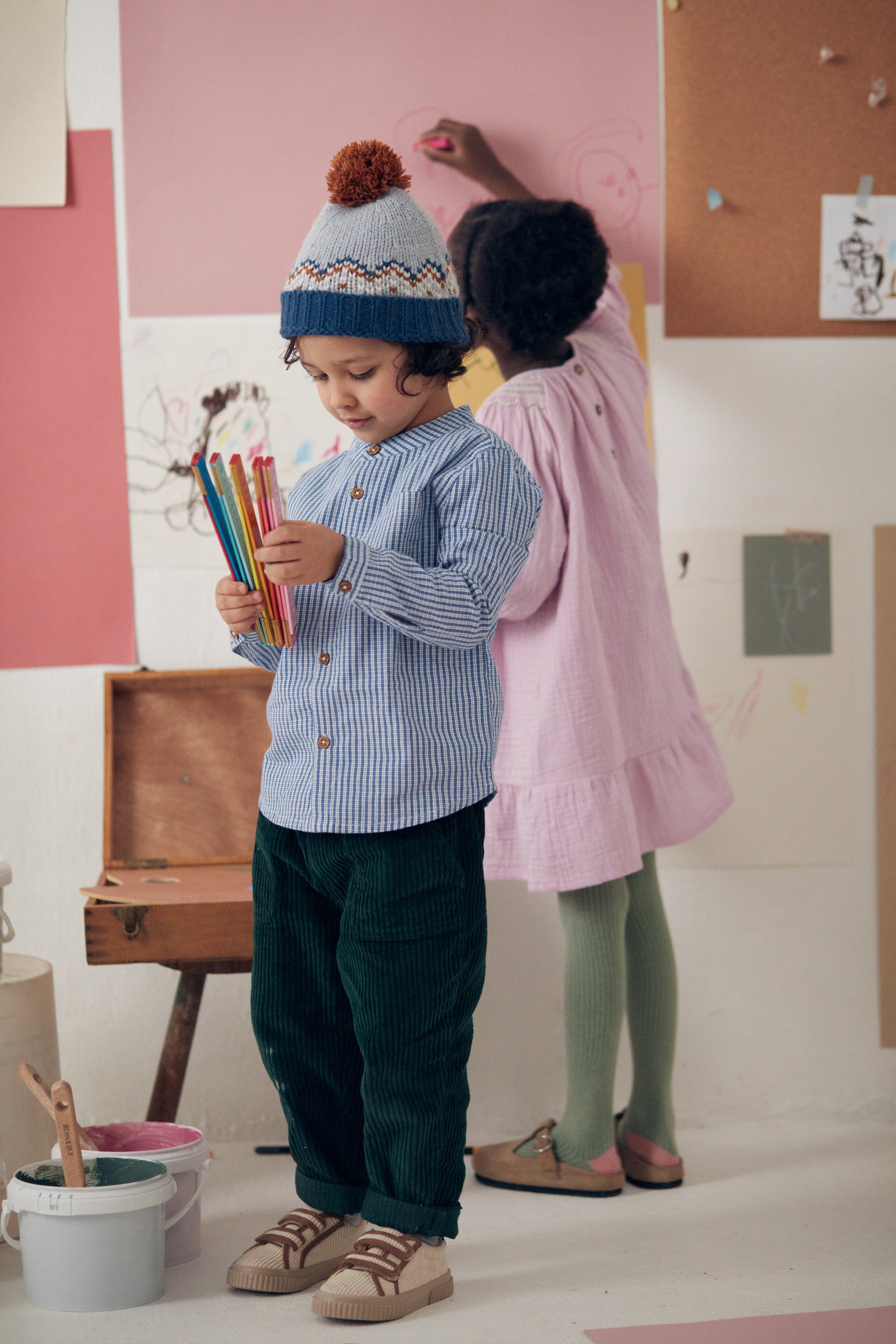 Formal boys shirt with modern twist, this organic cotton boys shirt with blue and white checkers is trendy by Louise Misha sustainable kids clothing online.
