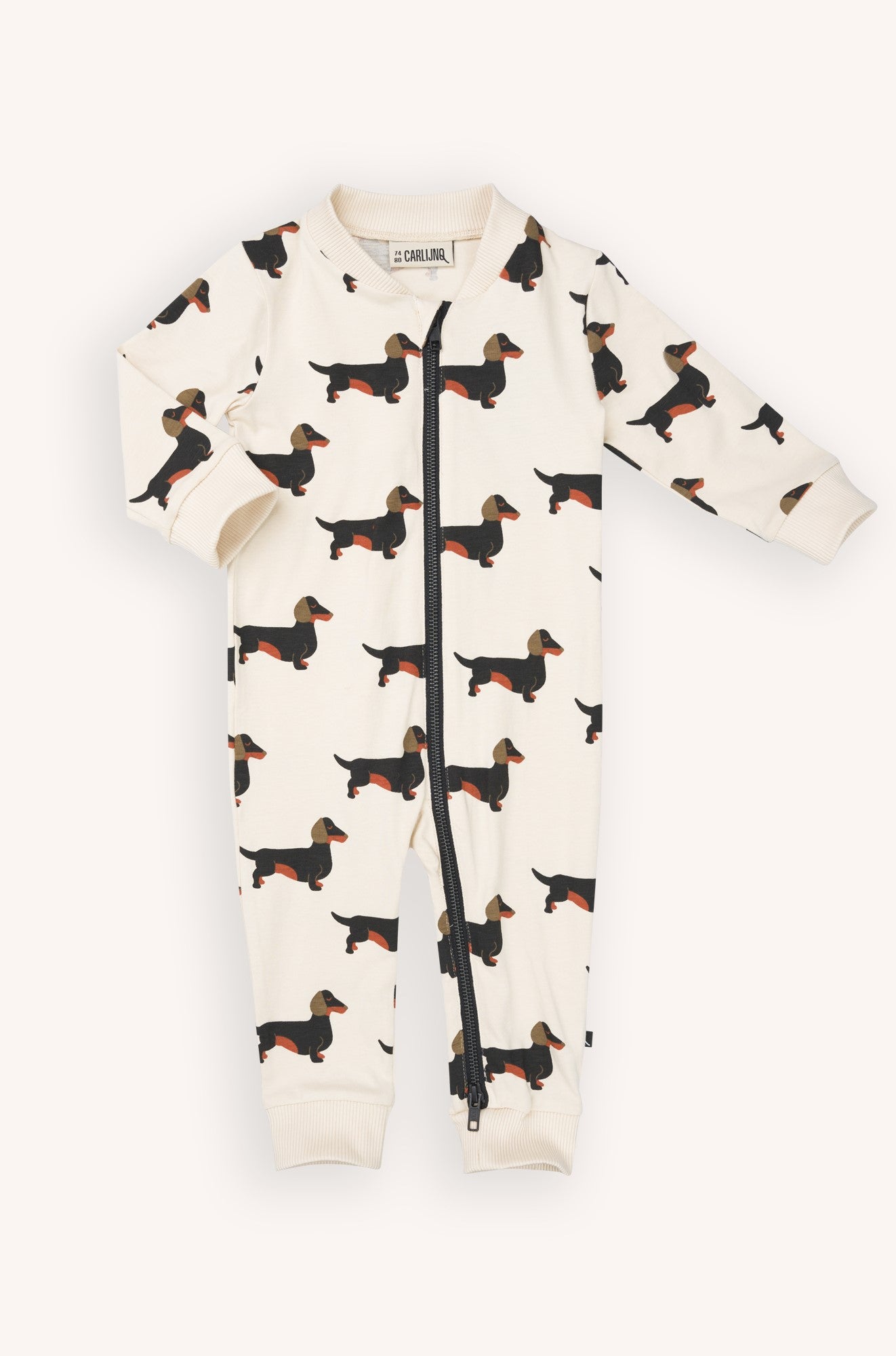 Organic cotton baby onesie with long sleeves and zipper with dachshund print. MiliMilu Lifestyle offers organic cotton baby clothing and baby Christmas gifts.