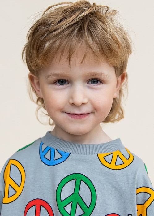 Kids wearing CarlijnQ Peace sweater styled with organic cotton joggers HK SG UK AU