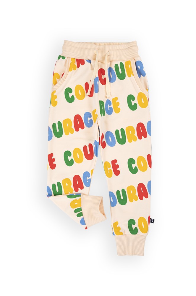 Kids organic cotton sweatpants with all over Courage print in sizes from toddler to tween. Shop MiliMilu Lifestyle sustainable and eco-friendly kids clothing.