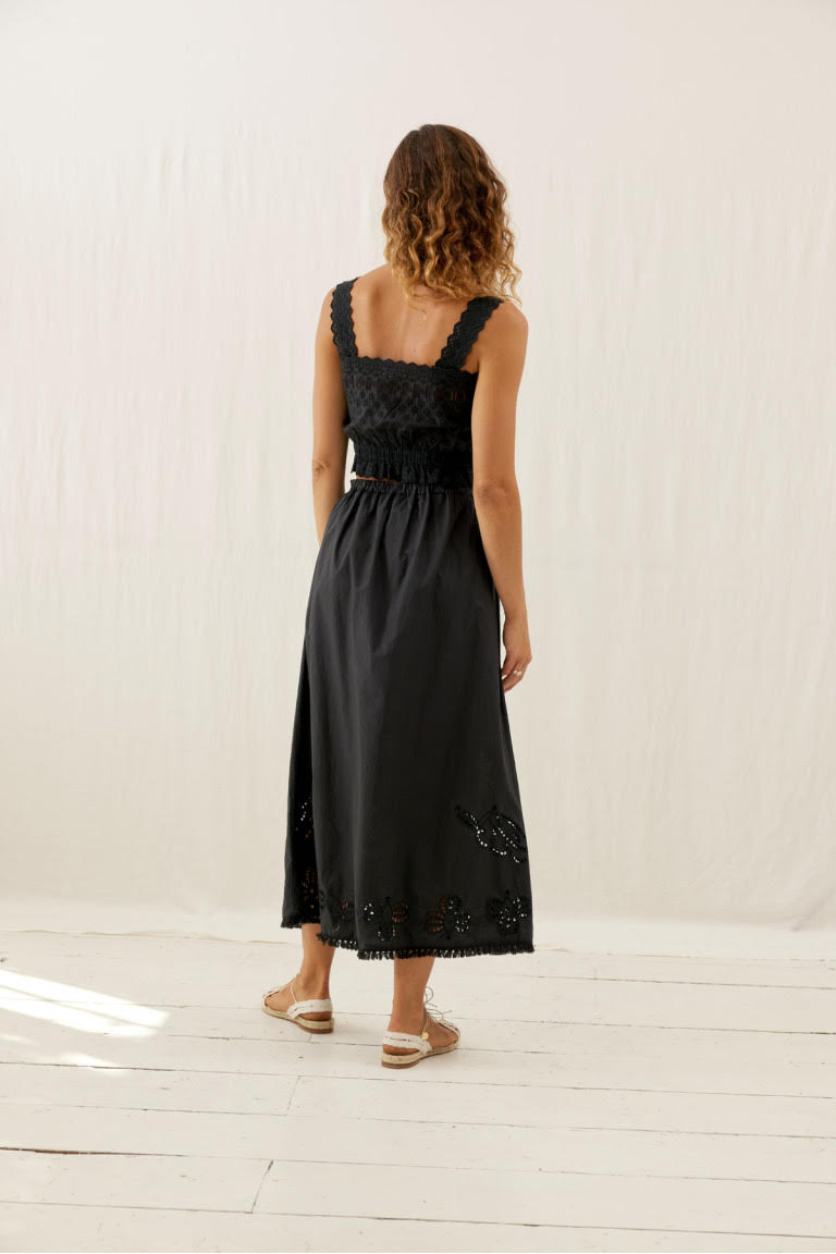 We absolutely adore the vintage-inspired black skirt, Paola! These long skirts for women have beautiful embroidery details are made with light and breathable organic cotton by Louise Misha. Shop women beachwear and women office skirt online, the best black skirt that are versatile. Shop sustainable women fashion online