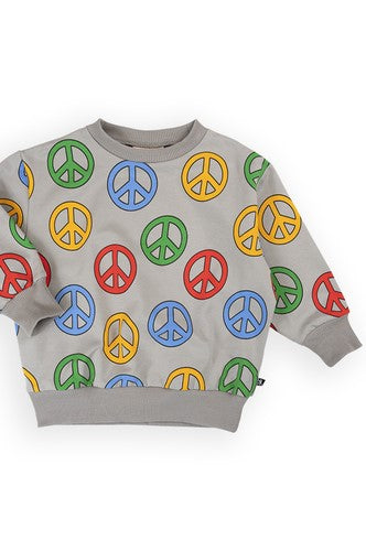 Close-up of Peace design print on kids organic cotton sweater