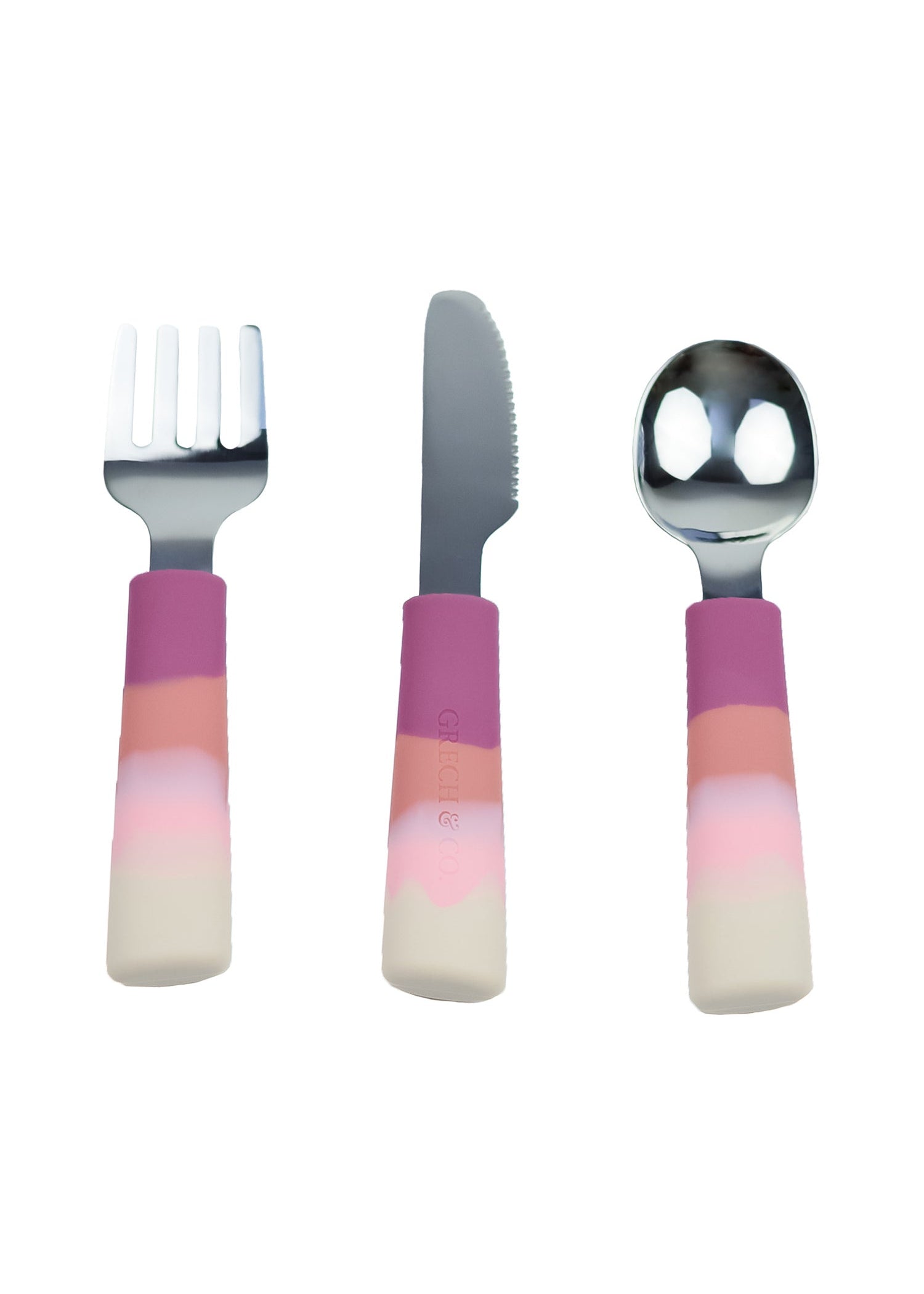 Grech & Co 3-piece kids cutlery set in Blossom Ombre pink — fork, knife and spoon with cream blush peach and deep mauve silicone handles and stainless steel heads on white background at Milimilu