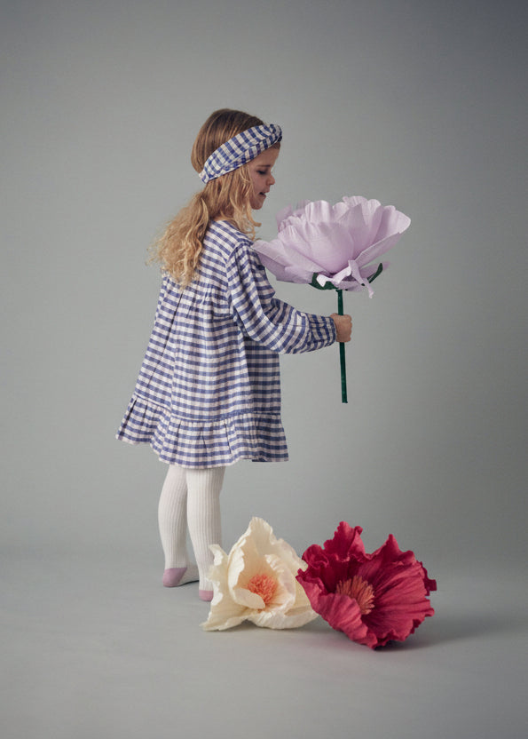 Girl wearing Massilia dress blue purple checks - bohemian organic cotton by Louise Misha