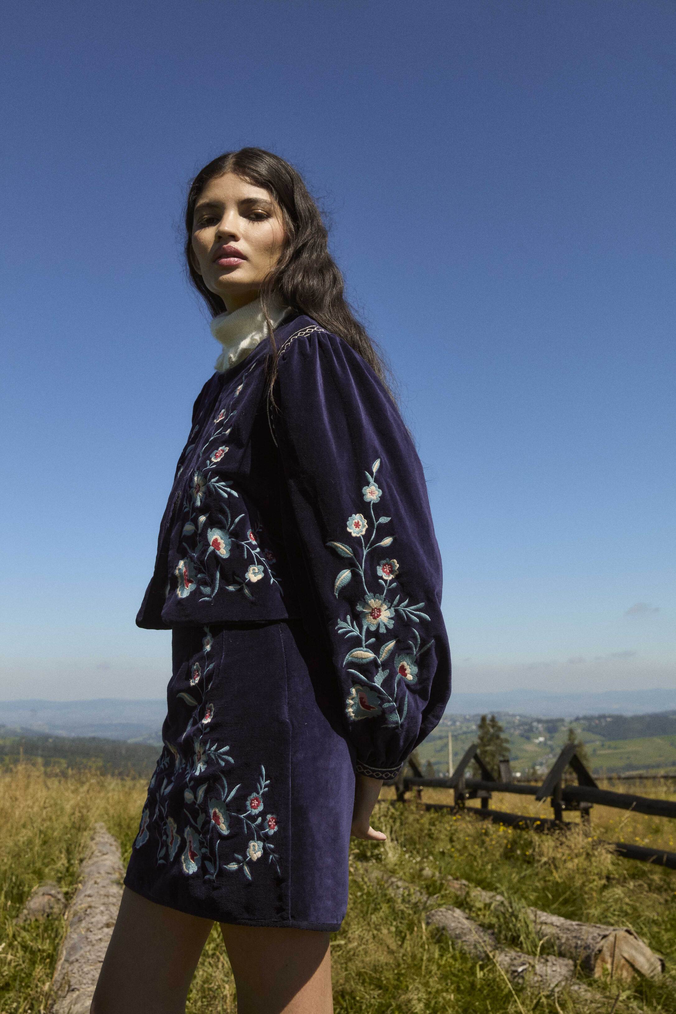 The high waisted skirt is must have womans sustainable wardrobe, made with organic cotton in a midnight color, this skirt features velvet texture with embrodery