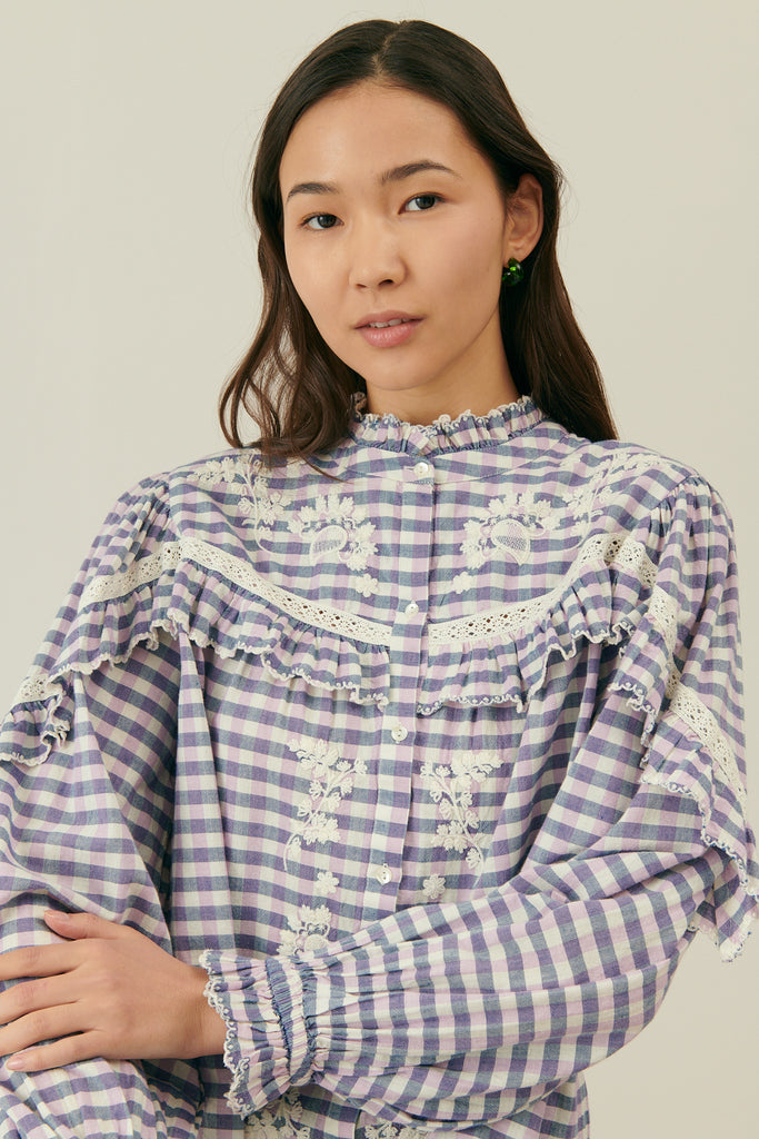 Women blouse is crafted from organic cotton fabric in checkers print with embrodery and is also part of Mommy and me fashion. Shop sustainable women fashion.