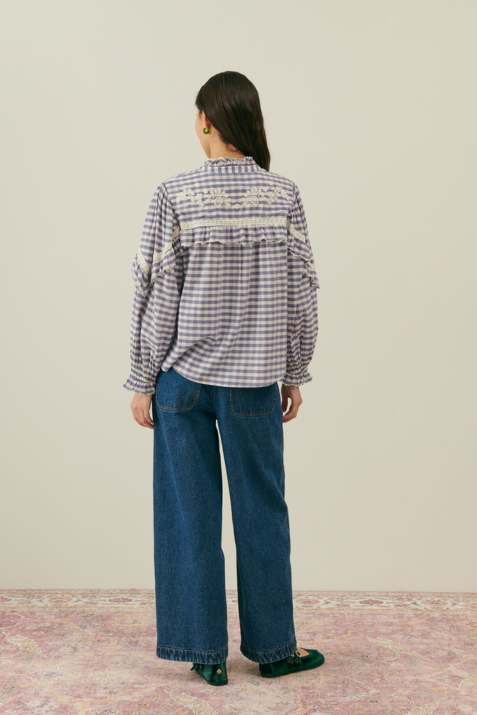 Women blouse is crafted from organic cotton fabric in checkers print with embrodery and is also part of Mommy and me fashion. Shop sustainable women fashion.