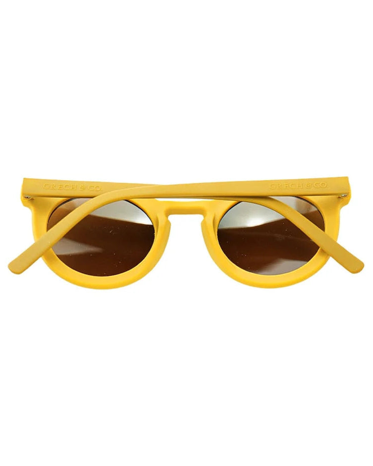 Sustainable sunglasses in yellow by Grech & Co are bendable and lighweight with UV protection. Mini Me styles and family macthing sunglasses are available.