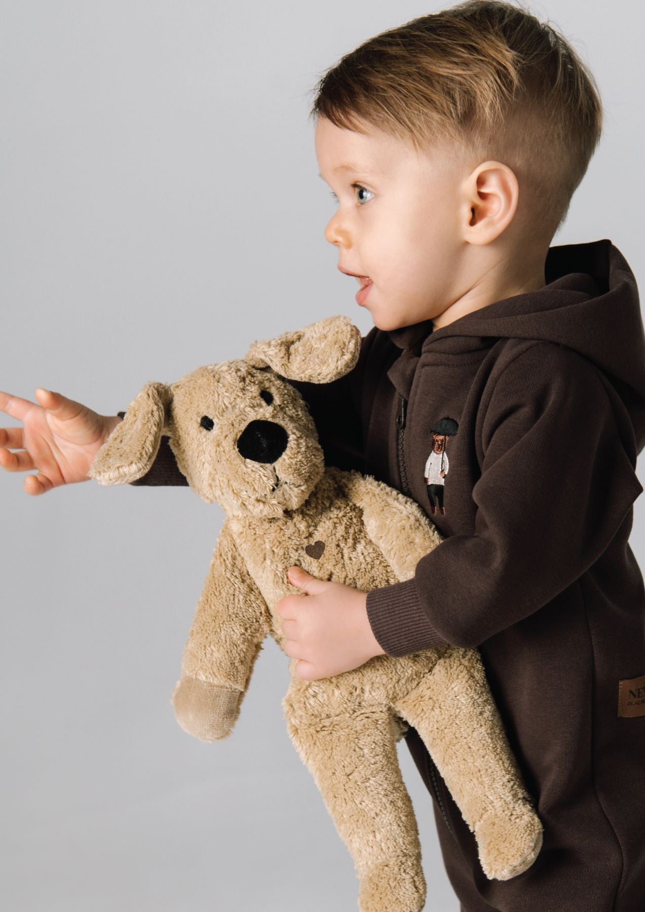 Organic cotton toy Dog is handmade without any harmful chemicals and filled with corn fiber and fruit seeds. The best sustainable baby toys and gifts online.