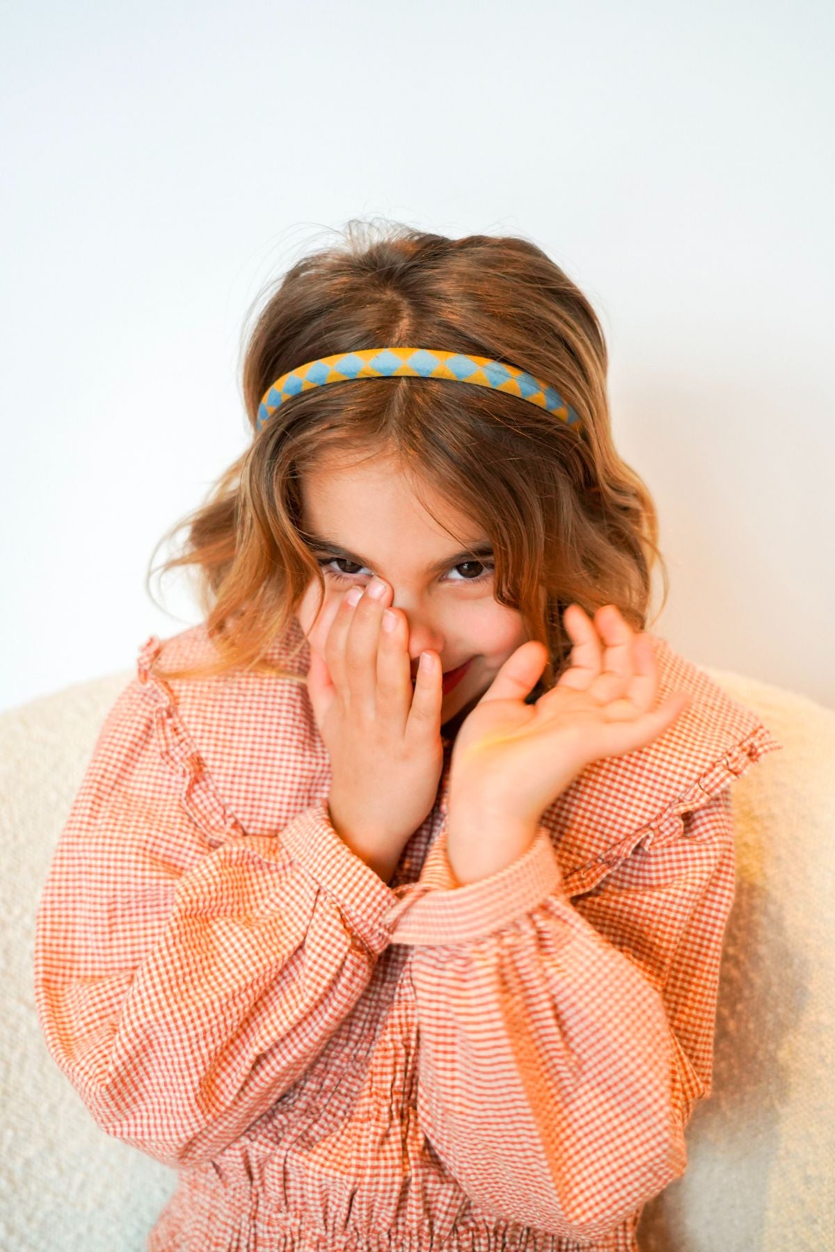 Organic cotton headbands in check print by Grech&Co are lightweight and easy to wear. Shop sustainable hair accesories for girls at MiliMilu Lifestyle.