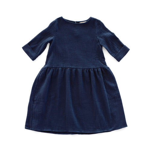 Beautifully handcraft our Back to Nature navy girls dress with 3/4 sleeves for cooler weather from organic cotton to bring you closer to nature with the freedom it gives you. This product is made of 100% organic cotton (GOTS). This sustainable girls' dress is comfortable and soft. Mommy and Me styles are available.