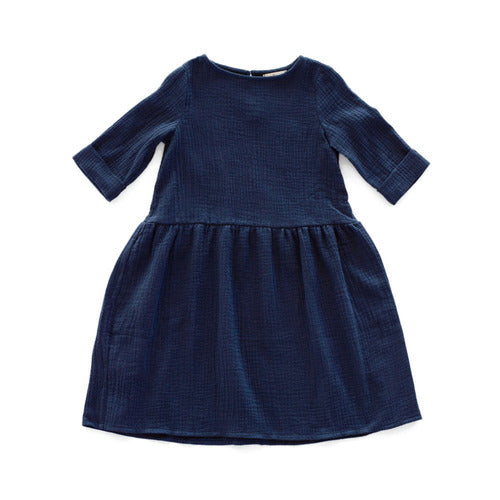 Beautifully handcraft our Back to Nature navy girls dress with 3/4 sleeves for cooler weather from organic cotton to bring you closer to nature with the freedom it gives you. This product is made of 100% organic cotton (GOTS).  This sustainable girls' dress is comfortable and soft. Mommy and Me styles are available.