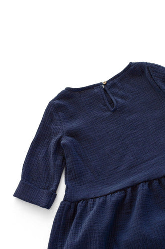 Beautifully handcraft our Back to Nature navy girls dress with 3/4 sleeves for cooler weather from organic cotton to bring you closer to nature with the freedom it gives you. This product is made of 100% organic cotton (GOTS). This sustainable girls' dress is comfortable and soft. Mommy and Me styles are available.