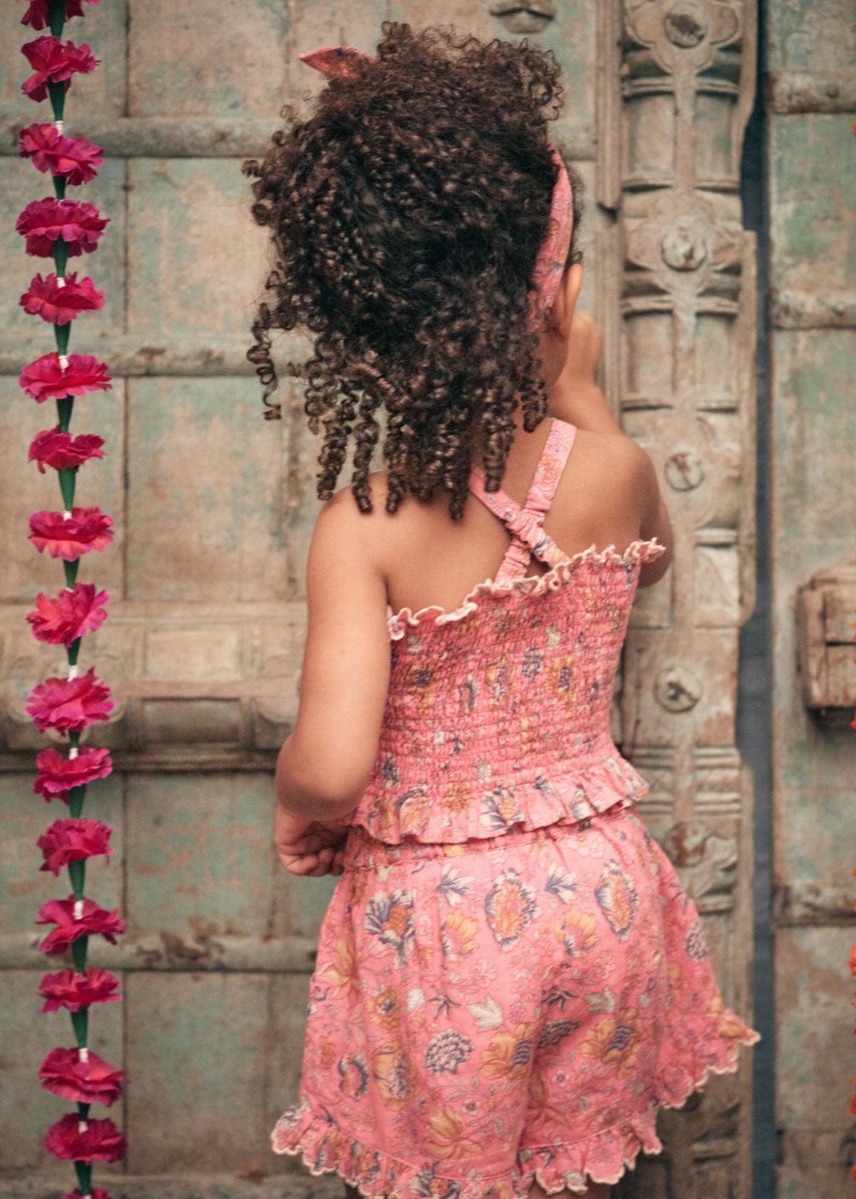 Girls' cropped top in pink by Louise Misha — adjustable cross-back straps, ages 1–8 years