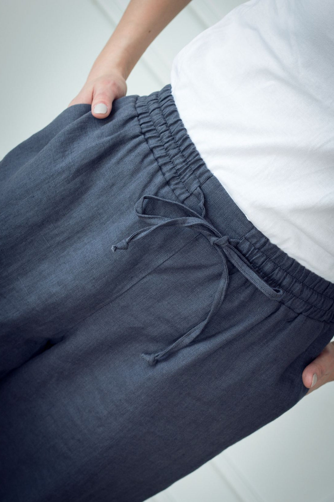 Slow-fashion women's linen joggers are handcrafted from pure linen. Elastic waist makes trousers adjustable to your fit and they come with two side pockets.