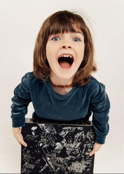 Close up detail of blue velvet kids joggers texture and quality, premium organic cotton fabric