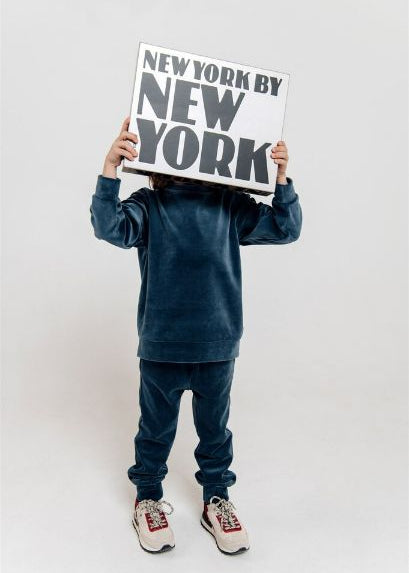 Sustainable kids' blue velvet jumper by Hebe — soft, breathable and perfect for play, travel and gifting