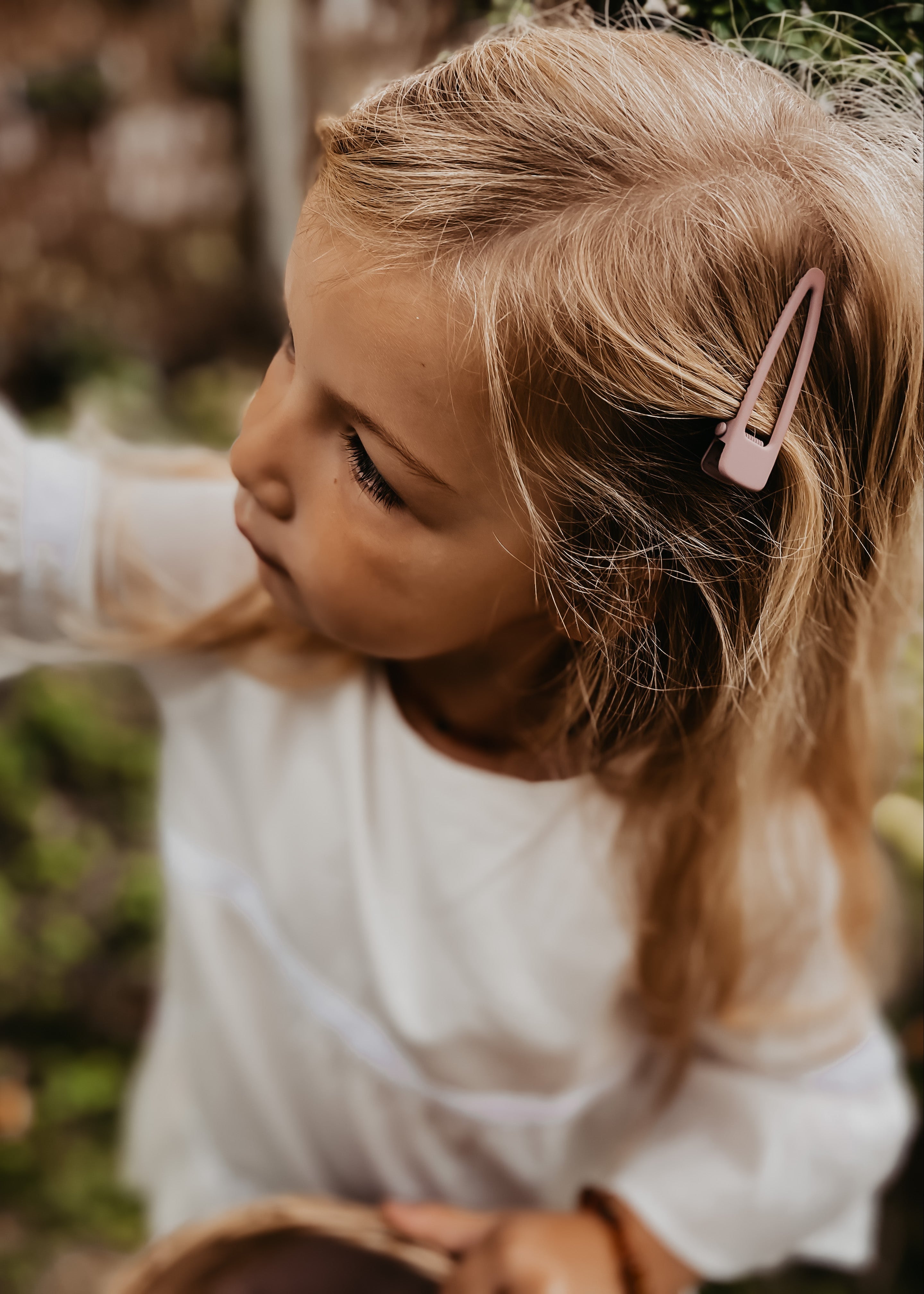 Girls wearing light pink hair clips - sustainable kids hair accessories perfect for everyday styling