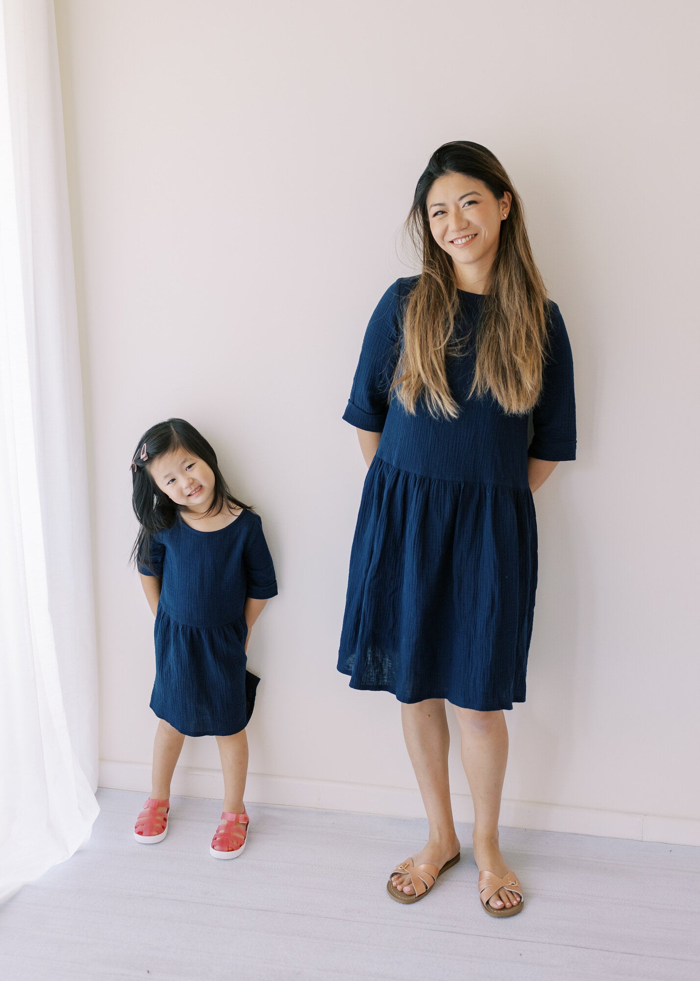 Beautifully handcraft our Back to Nature navy girls dress with 3/4 sleeves for cooler weather from organic cotton to bring you closer to nature with the freedom it gives you. This product is made of 100% organic cotton (GOTS). This sustainable girls' dress is comfortable and soft. Mommy and Me styles are available.