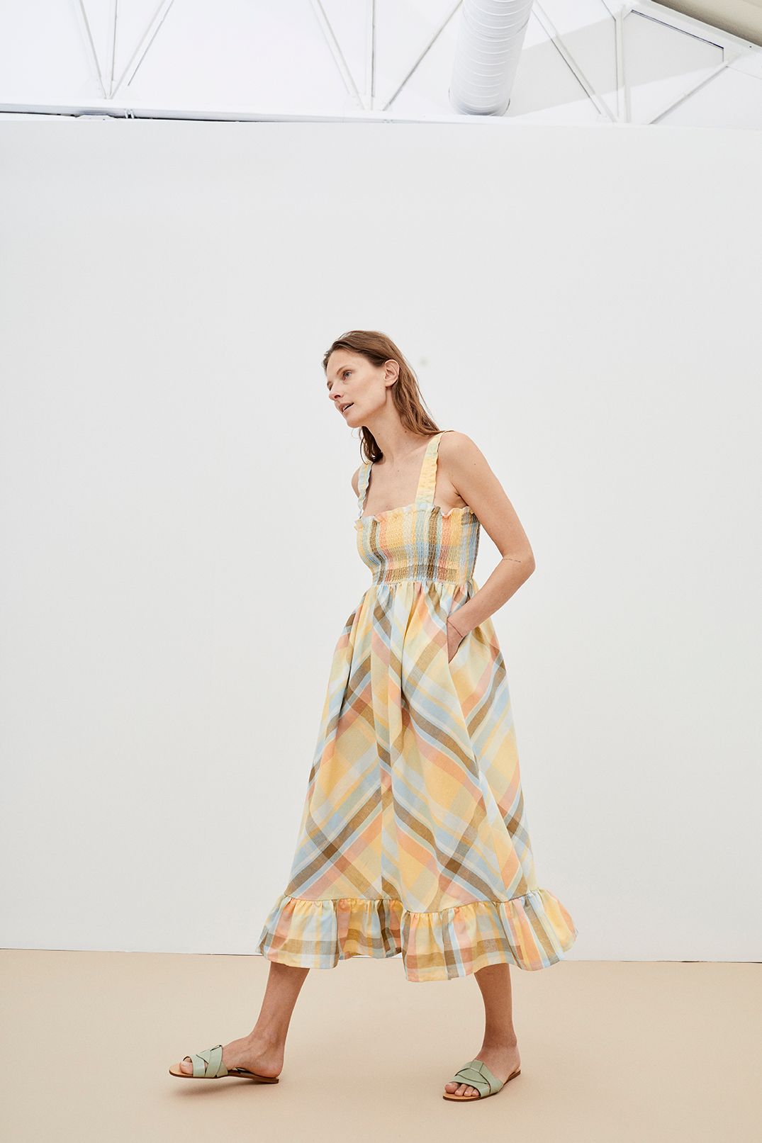 Breathable and lightweight organic cotton women summer dress is a flowy and feminine midi dress in checkered by The New Society. Sustainable women fashion.