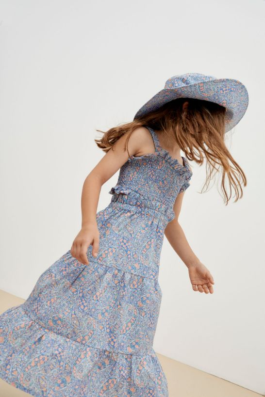 Breathable & lightweight liberty cotton girl dress with an open back is stylish and comfortable. The liberty cotton girl dress and Mini Me dresses online.