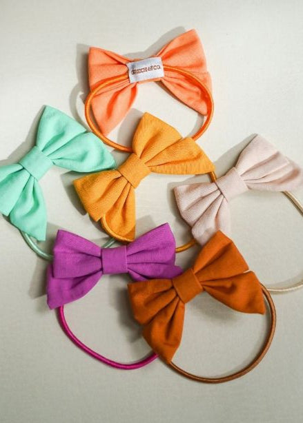 Girl hair ties that come in oat & aster at MiliMilu Lifestyle. These girl hair ties are the best gift for girls for birthdays and Christmas stocking fillers.