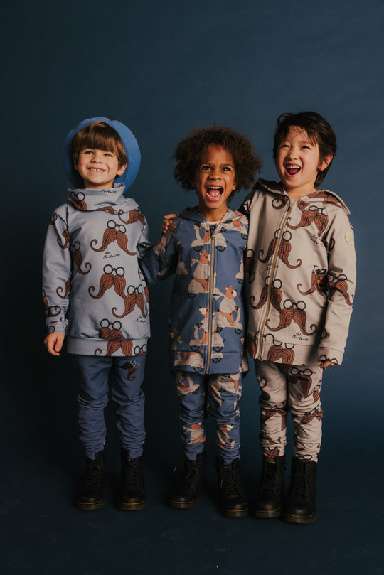 Child wearing organic cotton basic pants in dark blue by Dear Sophie,comfortable everyday joggers