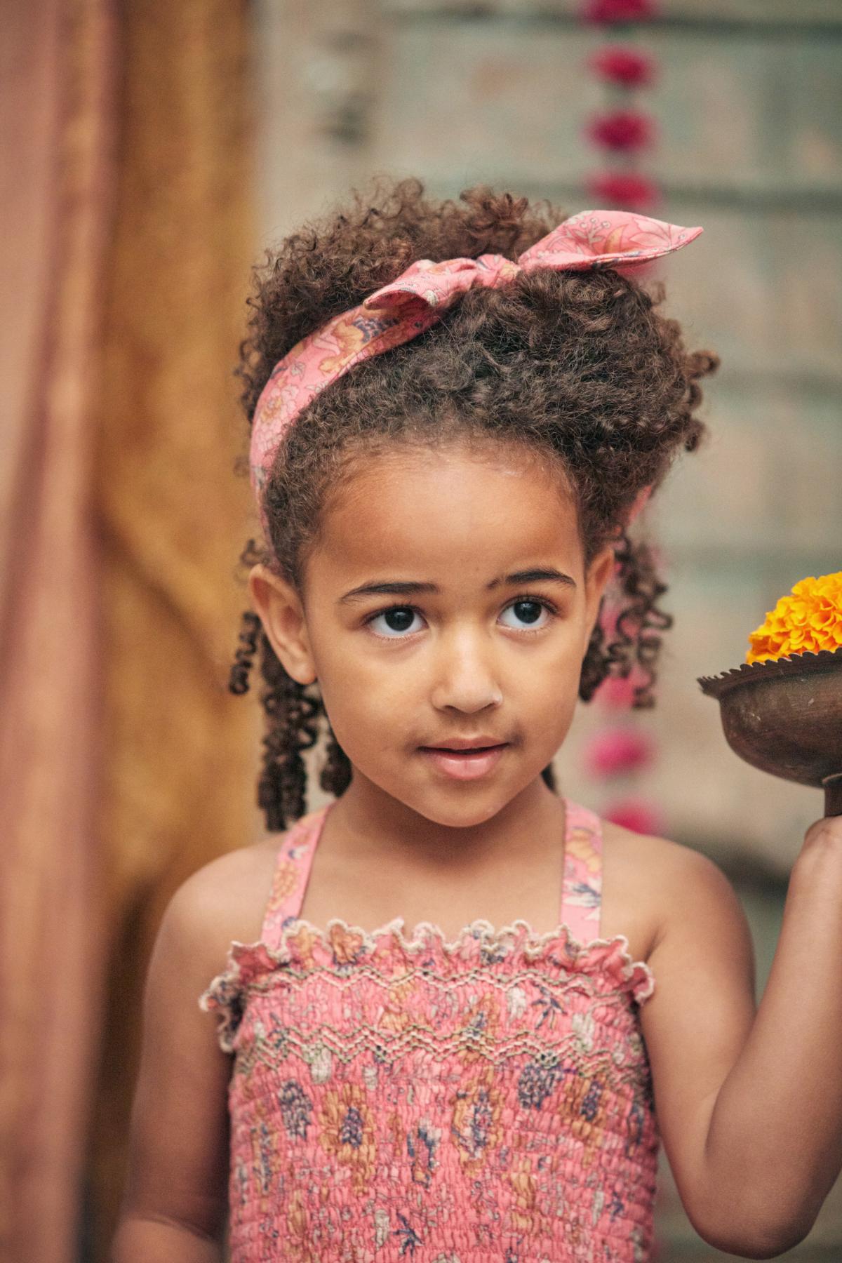 Pink organic cotton cropped girl's top is breathable and lightweight by Louise Misha. MiliMilu offers sustainable kids clothing & organic cotton baby clothing.
