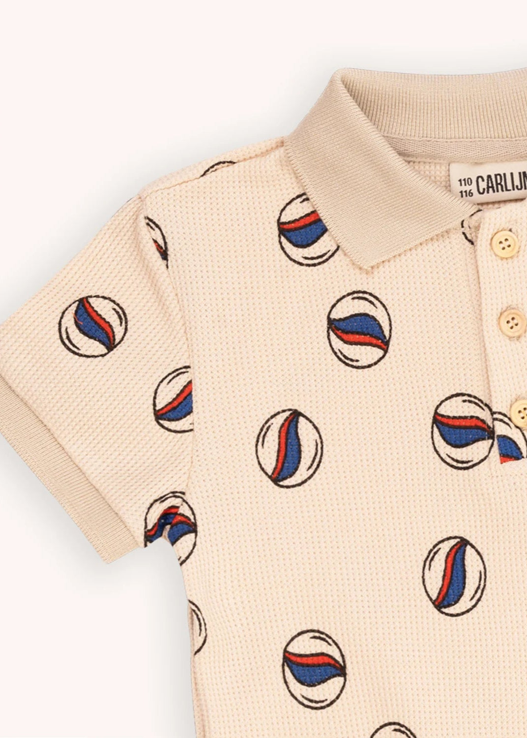 Organic cotton boys polo shirt with a stylish marble print. MiliMilu Lifestyle offers the best sustainable kids and teens clothing online.