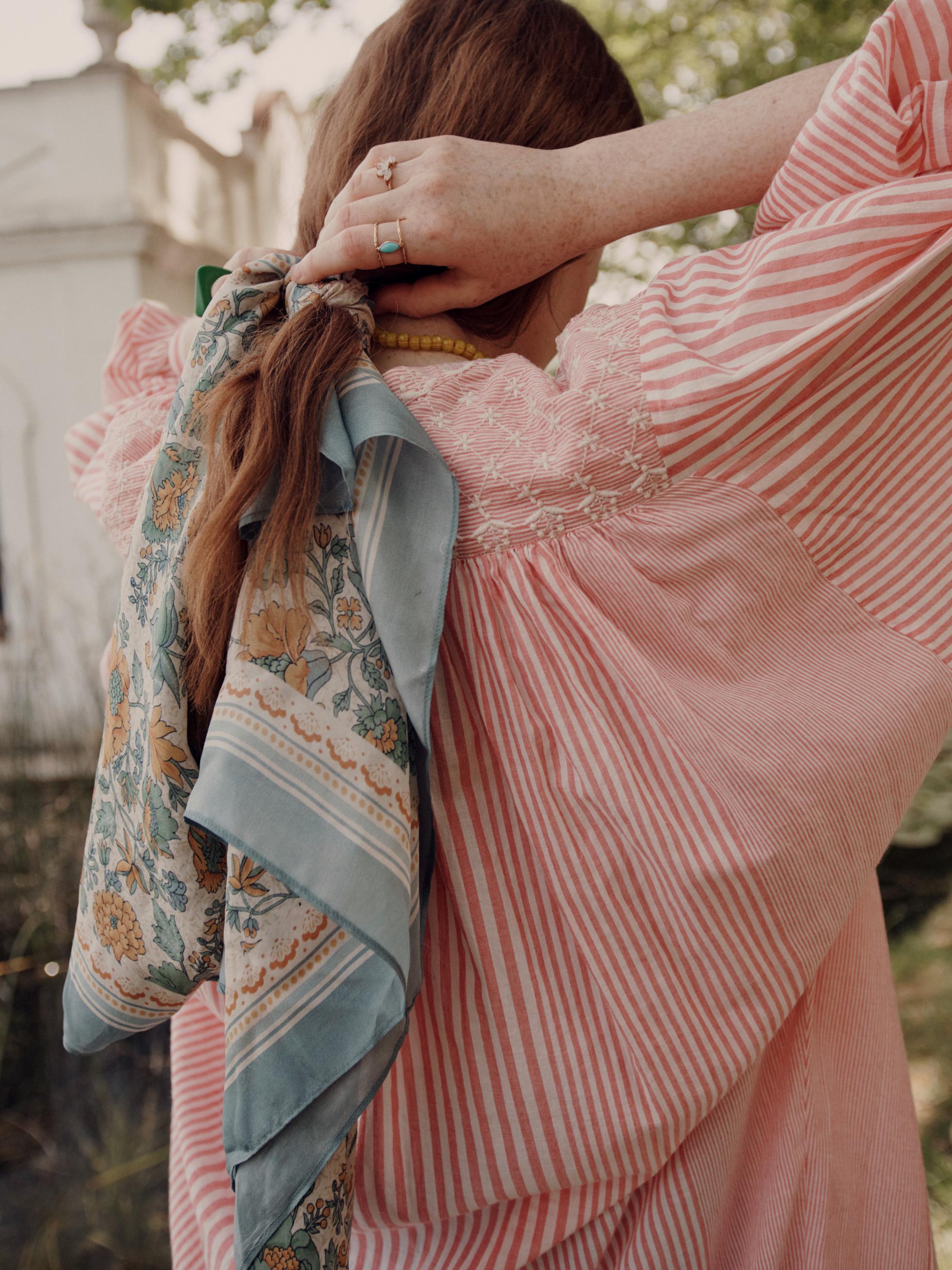 The women's shirt dress is breathable and lightweight and long, made with organic cotton midi length by Louise Misha online at MiliMilu Lifestyle.