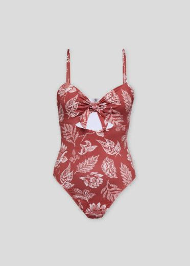 Woman wearing The New Society Sienna swimsuit – feminine cutout detail, thin straps, eco-friendly beachwear