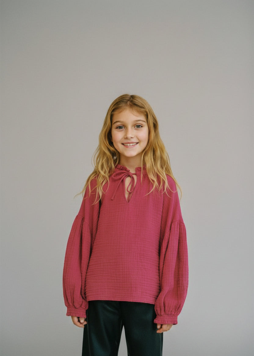 Close-up of bougainvillea tie-dye pattern - organic cotton chiffon Olivia blouse for girls