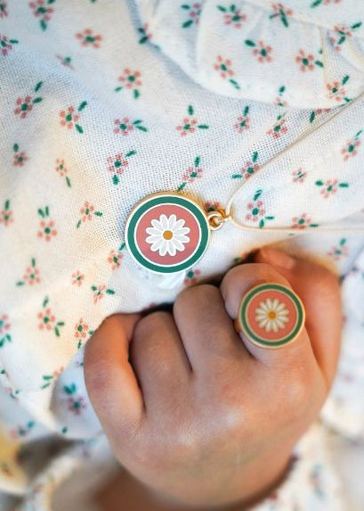 Girl wearing Grech & Co flower friendship ring eco-friendly adjustable kids jewellery HK SG AU UK