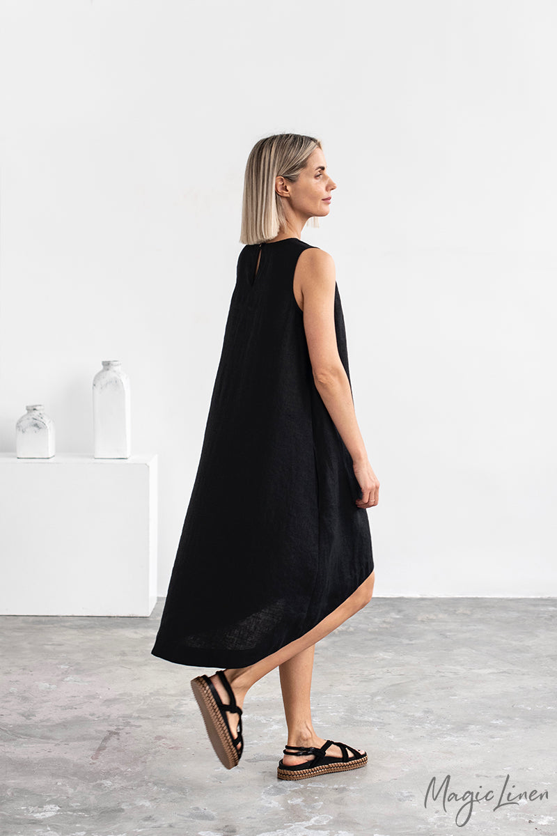 Toscana black linen women's dress is flowy and free-fitted, made with high-quality European linen, breathable and lightweight, perfect clothing for hot and humid weather. Simple and stylish women's black linen dress will be part of your capsule wardrobe, shop women linen dresses online in Hong Kong and Singapore.