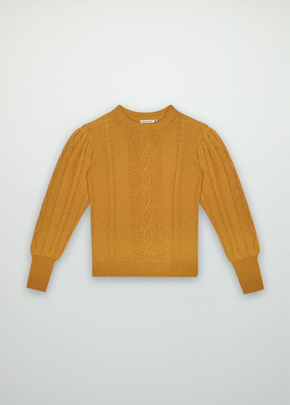 Recycled cashmere knitted jumper for women is super soft light and timeless in the mustard colour. The knitted jumper in mustard with puffy sleeves.