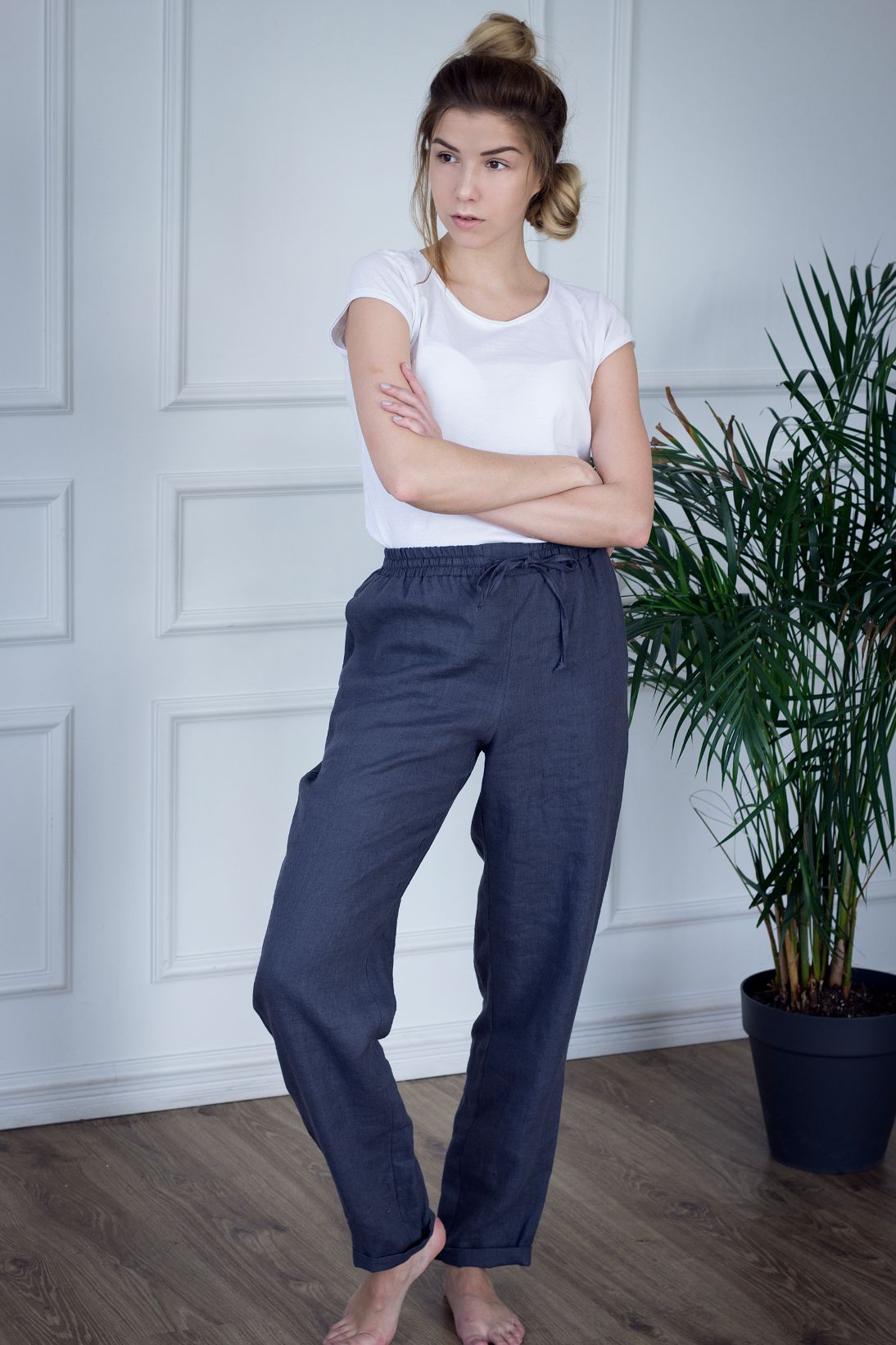 Slow-fashion women's linen joggers are handcrafted from pure linen. Elastic waist makes trousers adjustable to your fit and they come with two side pockets.