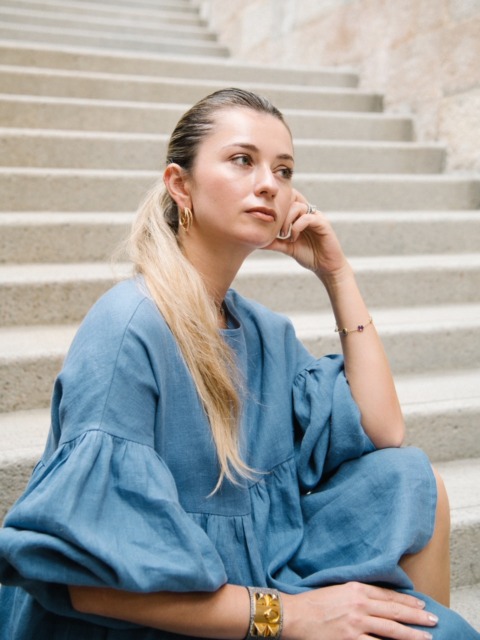 Slow fashion women's linen dress in french blue color with long voluminous sleeves made from pure linen. Timeless women's dress for capsule wardrobe.