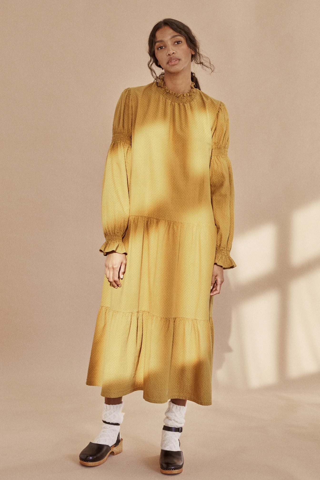 Breathable organic cotton women maxi dress online. This dress is flowy and lightweight, made with organic cotton in mustard colour by The New Society.