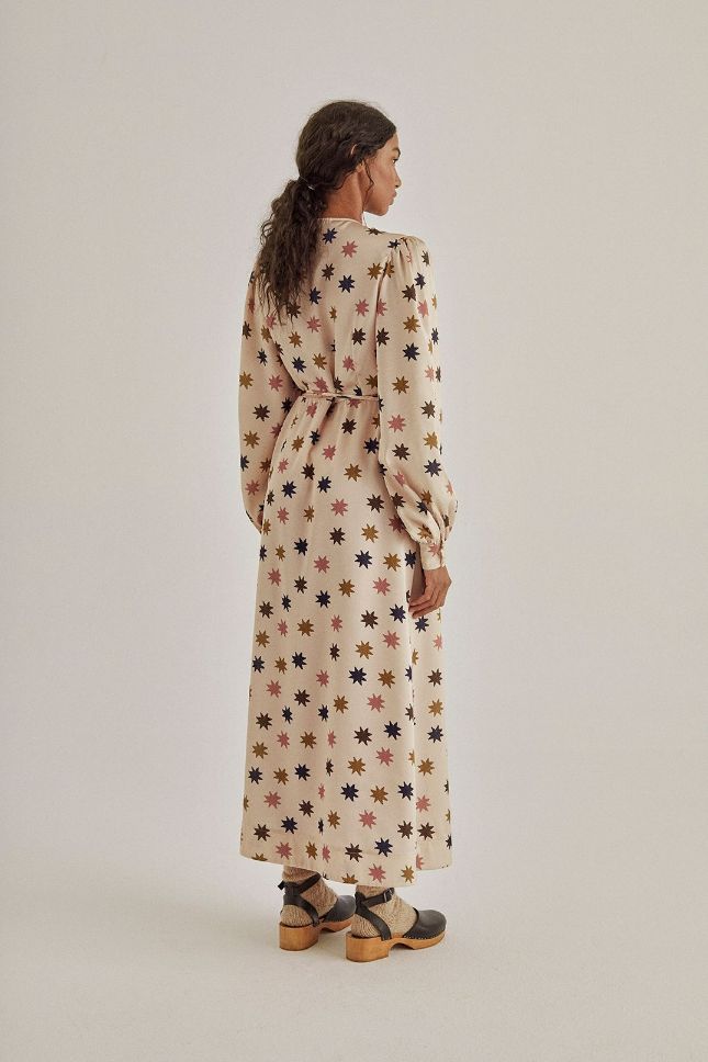 Sustainable women maxi wrap dresses with stars at Milimilu. The best dress for moms and also a bump-friendly dress as you wrap it as needed, best women dress.