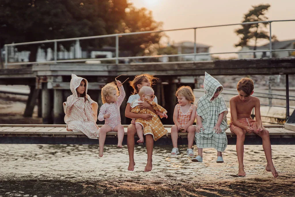 Eco-friendly kids swimwear with UPF sun protection – sustainable swimsuits and rashguards for children