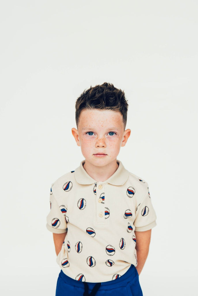 Try CarlijnQ organic cotton boy's polo shirt with a stylish marble print. It's comfortable, stylish, and perfect for any occasion. MiliMilu offers a great selection of sustainable fashion for kids and teens online in Hong Kong and Singapore. We offer a wide range of boy's polo shirts and boys' and teen shirts online.