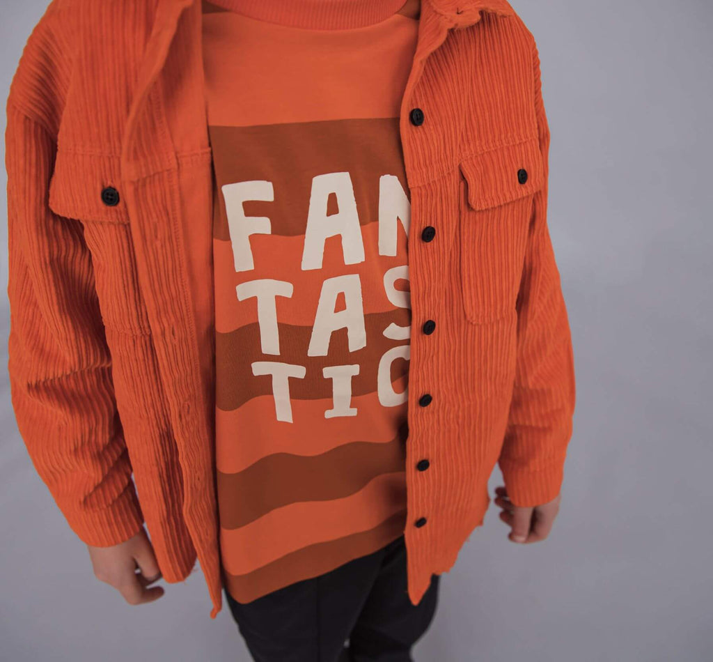 Shop organic cotton long-sleeved oversized kids' and tween tops in orange online in Hong Kong and Singapore at MiliMilu. This practical kid's long-sleeve top is made with lightweight organic (GOTS) cotton. Milimilu offers a wide range of kids and tween clothing, practical kids and tween presents and Christmas gifts.