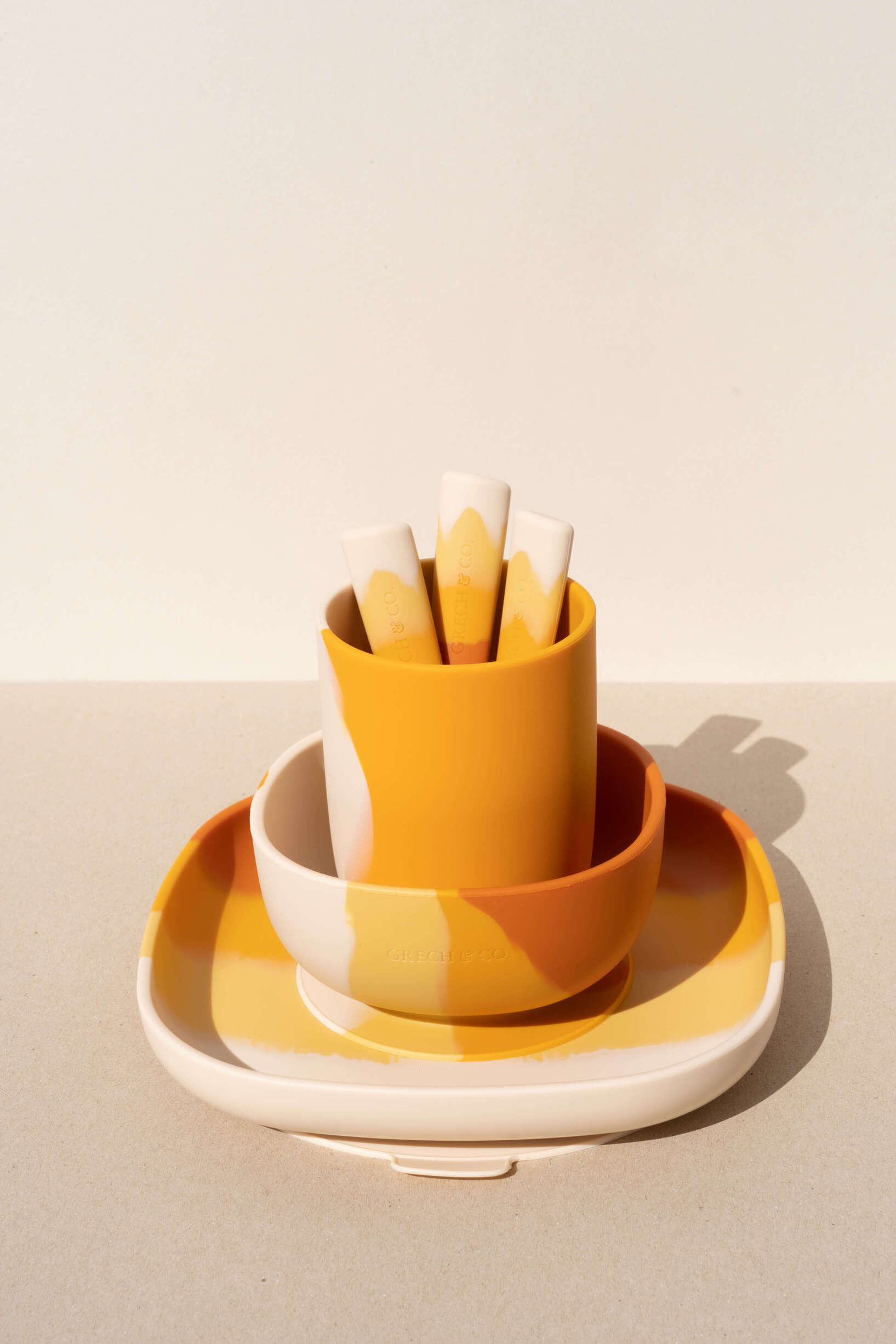 Set of silicon cups for toddlers & kids with easy hold in orange. Made by Grech&Co, the cups are eco-friendly and made of 100% LFGB grade silicone.