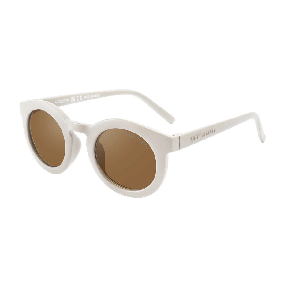 Sustainable sunglasses in white for adults y Grech&Co are eco-friendly sunglasses with polarised lenses & with UV400 protection. Mini-Me styles are available.